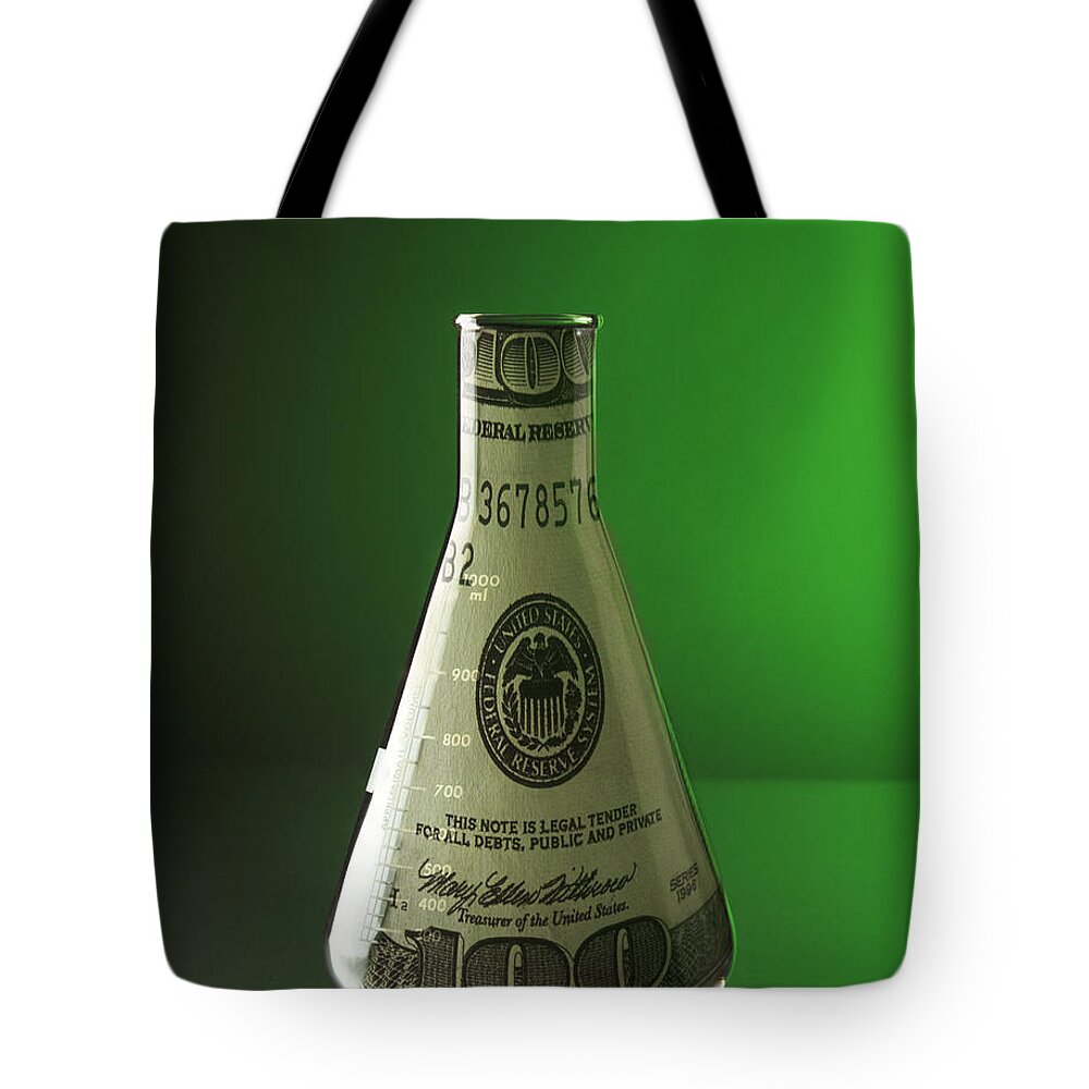 Glass Laboratory Flask Tote Bag featuring the photograph Research Funding by George Mattei