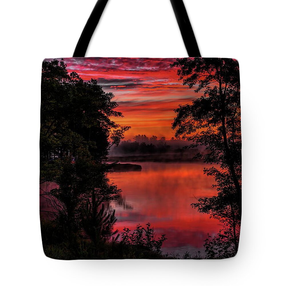 Backwater Tote Bag featuring the photograph Rhinelander Flowage Sunrise Reflection by Dale Kauzlaric