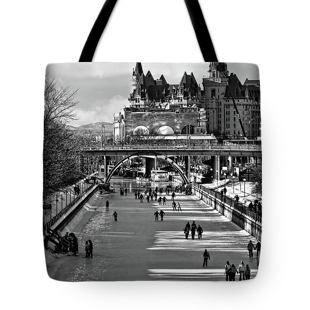 Rideau Canal Tote Bag featuring the photograph Rideau Canal is open for skating BW by Tatiana Travelways