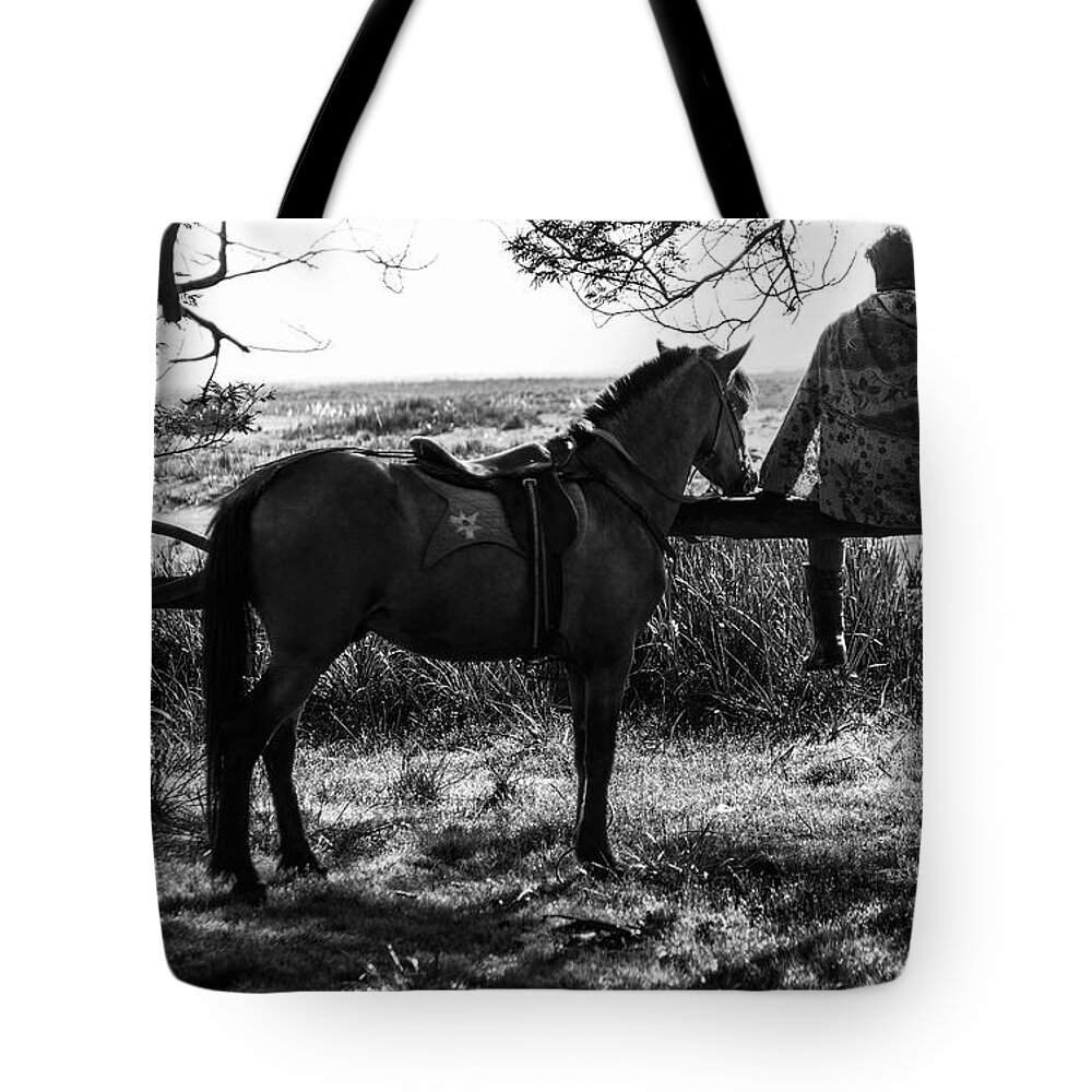 Landscape Tote Bag featuring the photograph Rider and horse taking break by Pradeep Raja Prints