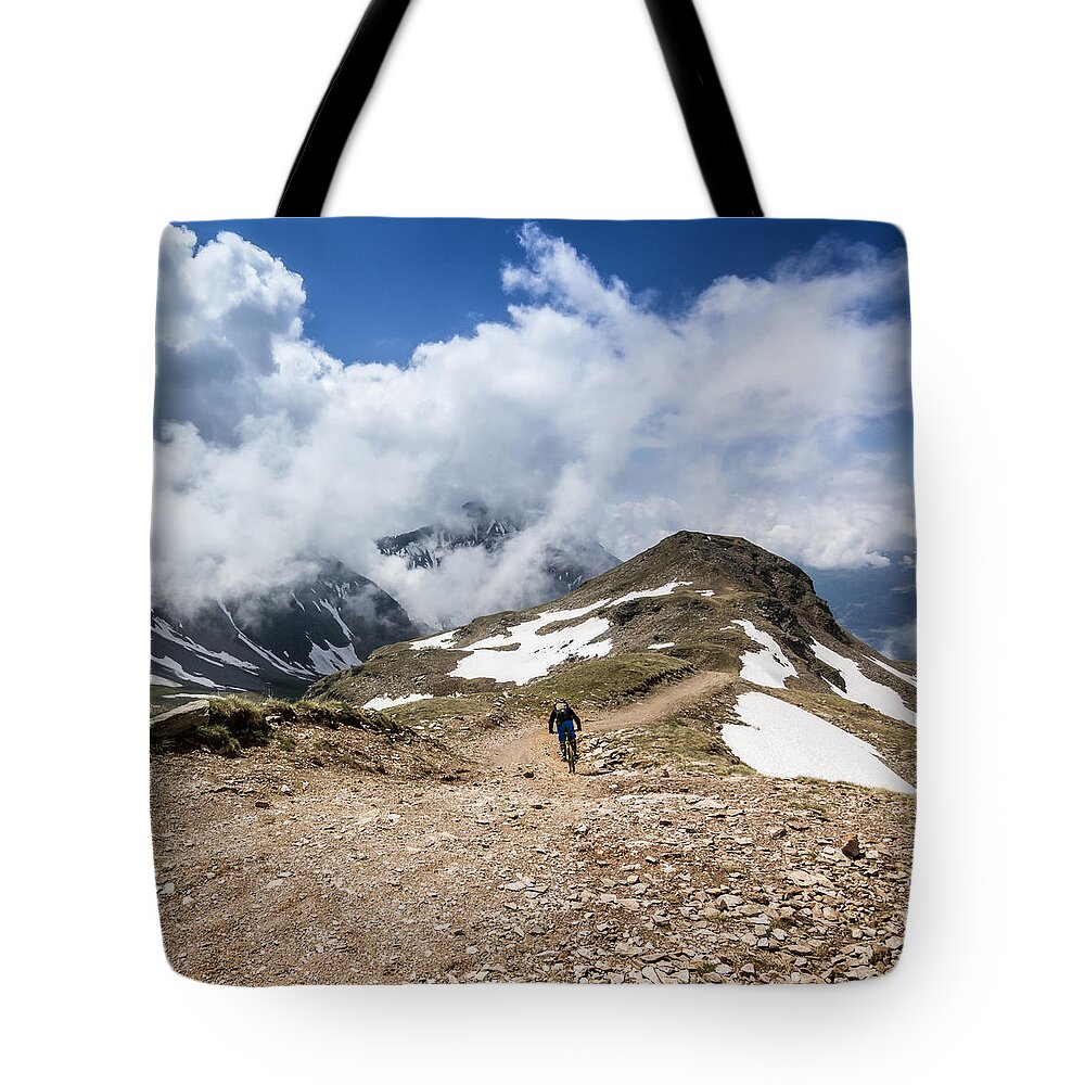 Downhill Tote Bag featuring the photograph Riding down the mountain by Snailsdevil Trailsnails