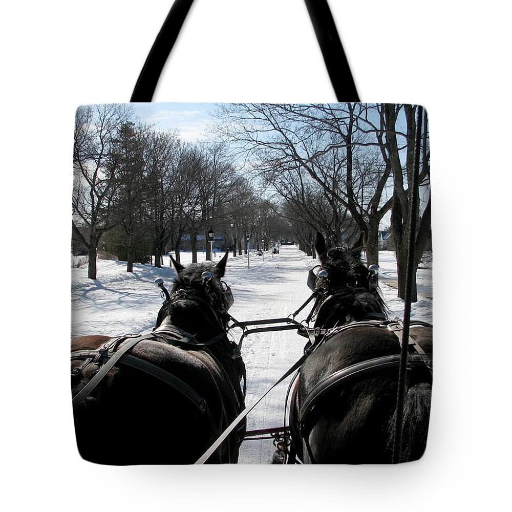 Winter Tote Bag featuring the photograph Riding into Town by Keith Stokes