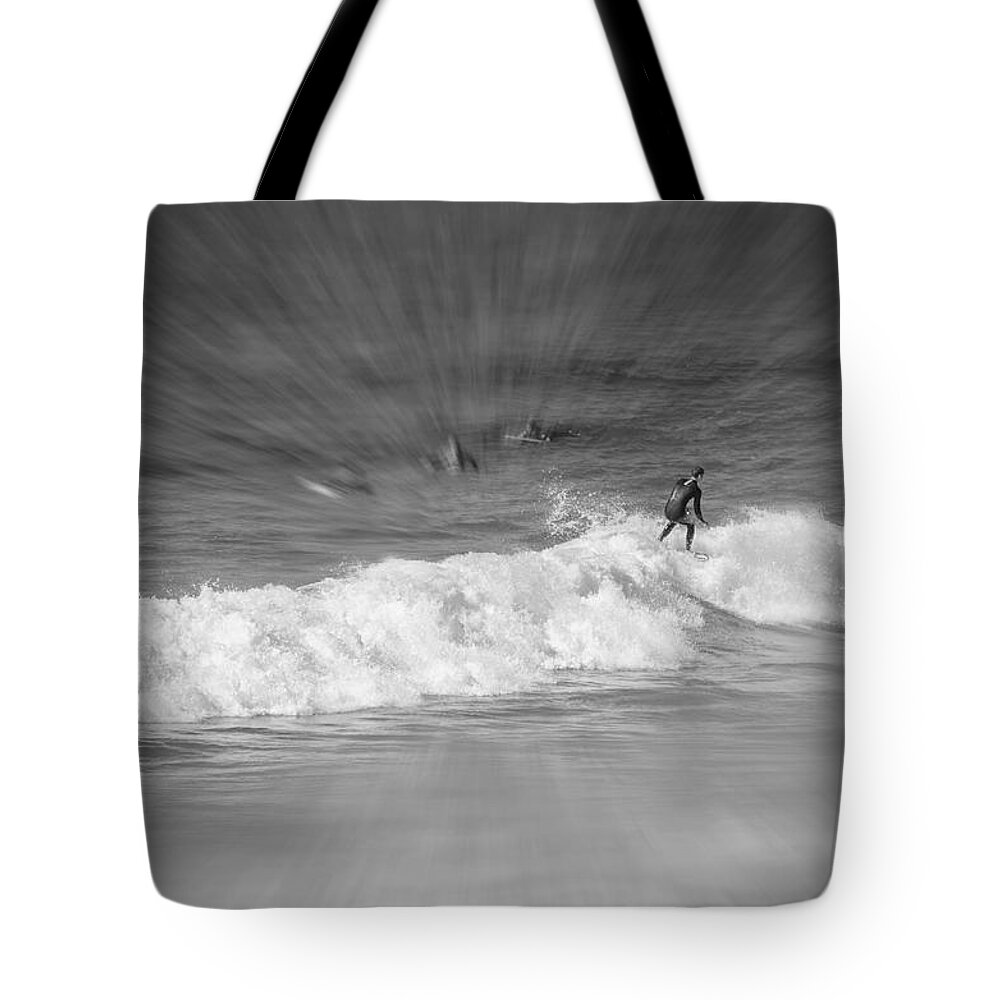 Riding It Out Tote Bag featuring the photograph Riding It Out by Susan McMenamin