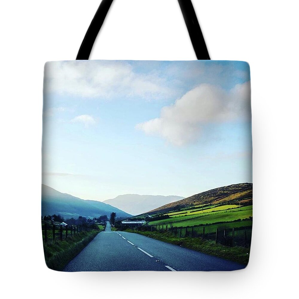 Blue Tote Bag featuring the photograph Riding The Blues by Aleck Cartwright
