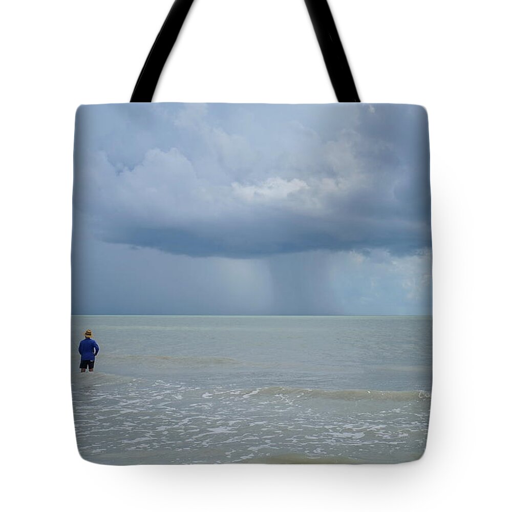 Fishing Tote Bag featuring the photograph Riding The Storm Out by Laurie Perry