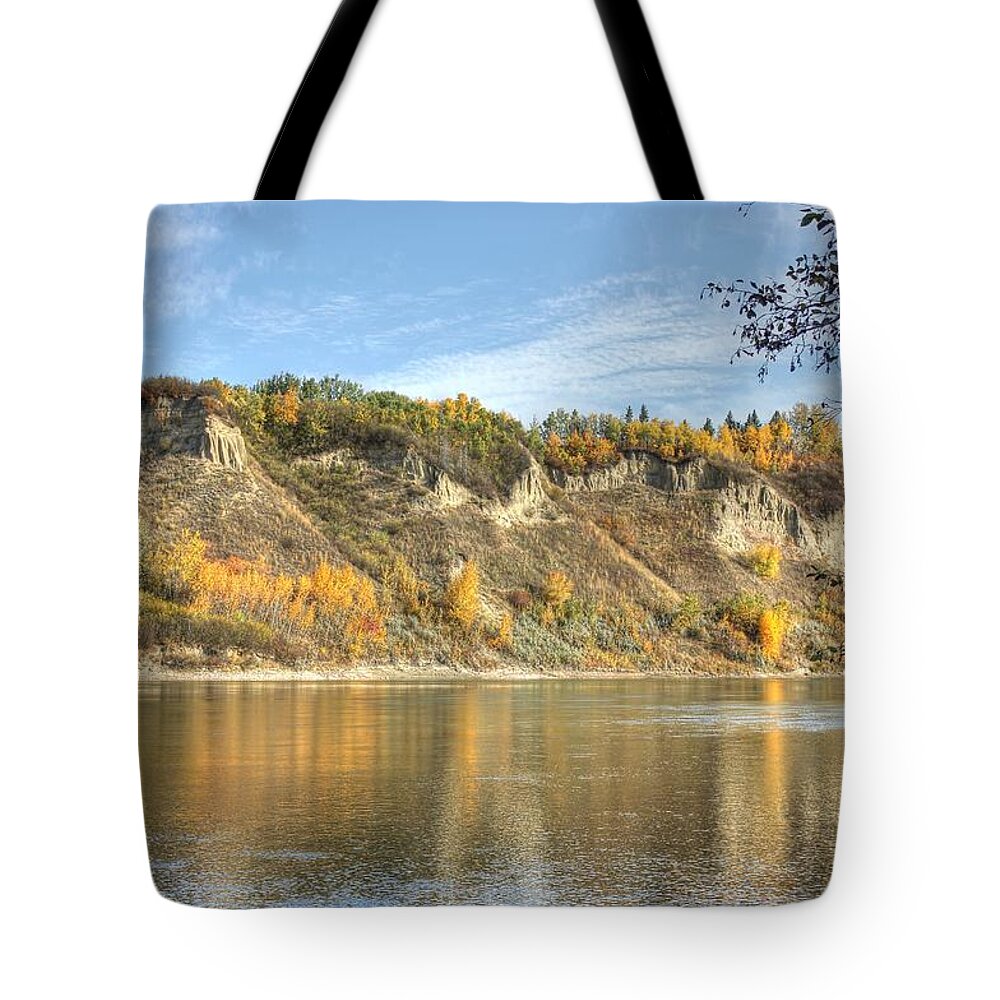 River Tote Bag featuring the photograph Riverbank in Autumn by Jim Sauchyn