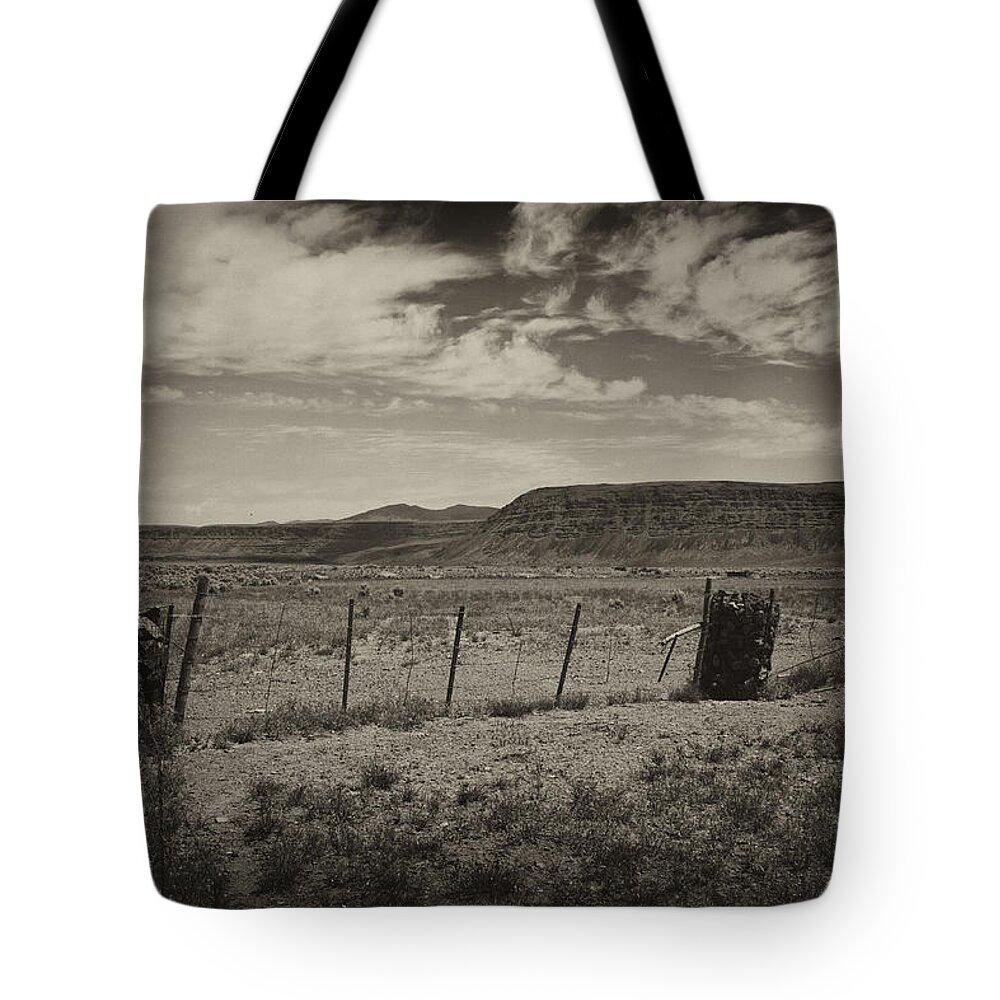 Fenceline Tote Bag featuring the photograph Rock Cribs and Fenceline by Hugh Smith
