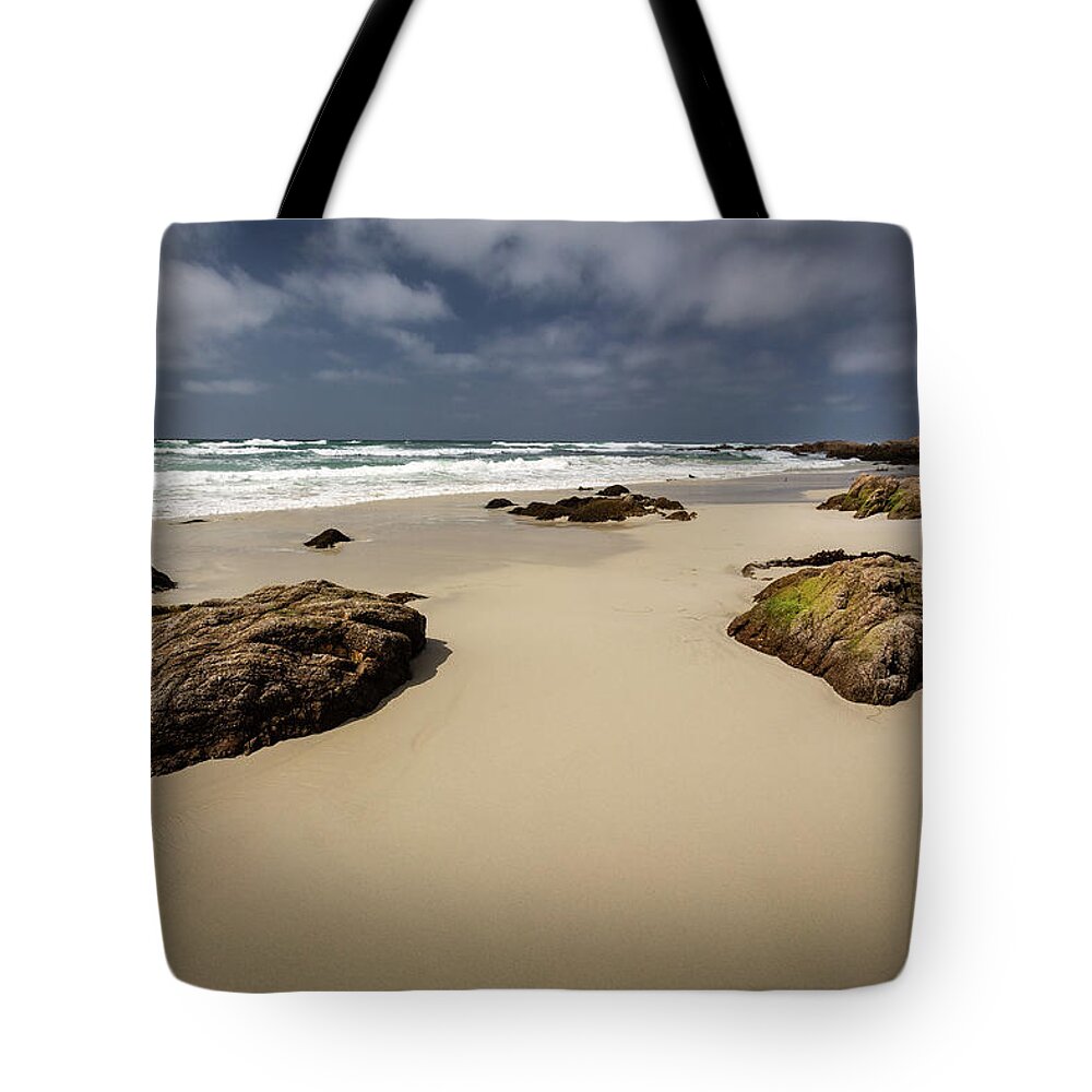 Rocks Tote Bag featuring the photograph Rocks on the Shore by Rick Strobaugh