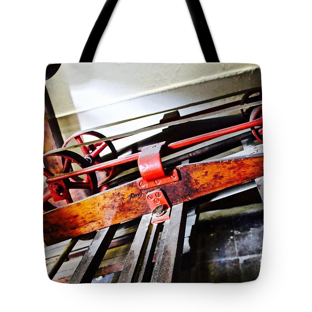 Industrial Equipment Tote Bag featuring the photograph Rolling forward by Phil Cappiali Jr