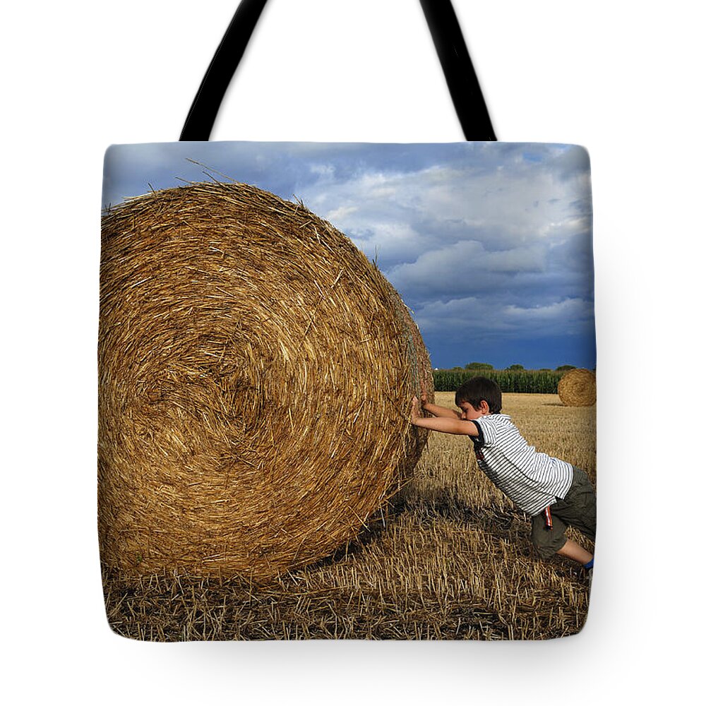Agriculture Tote Bag featuring the photograph Round Bale by Helmut Meyer zur Capellen