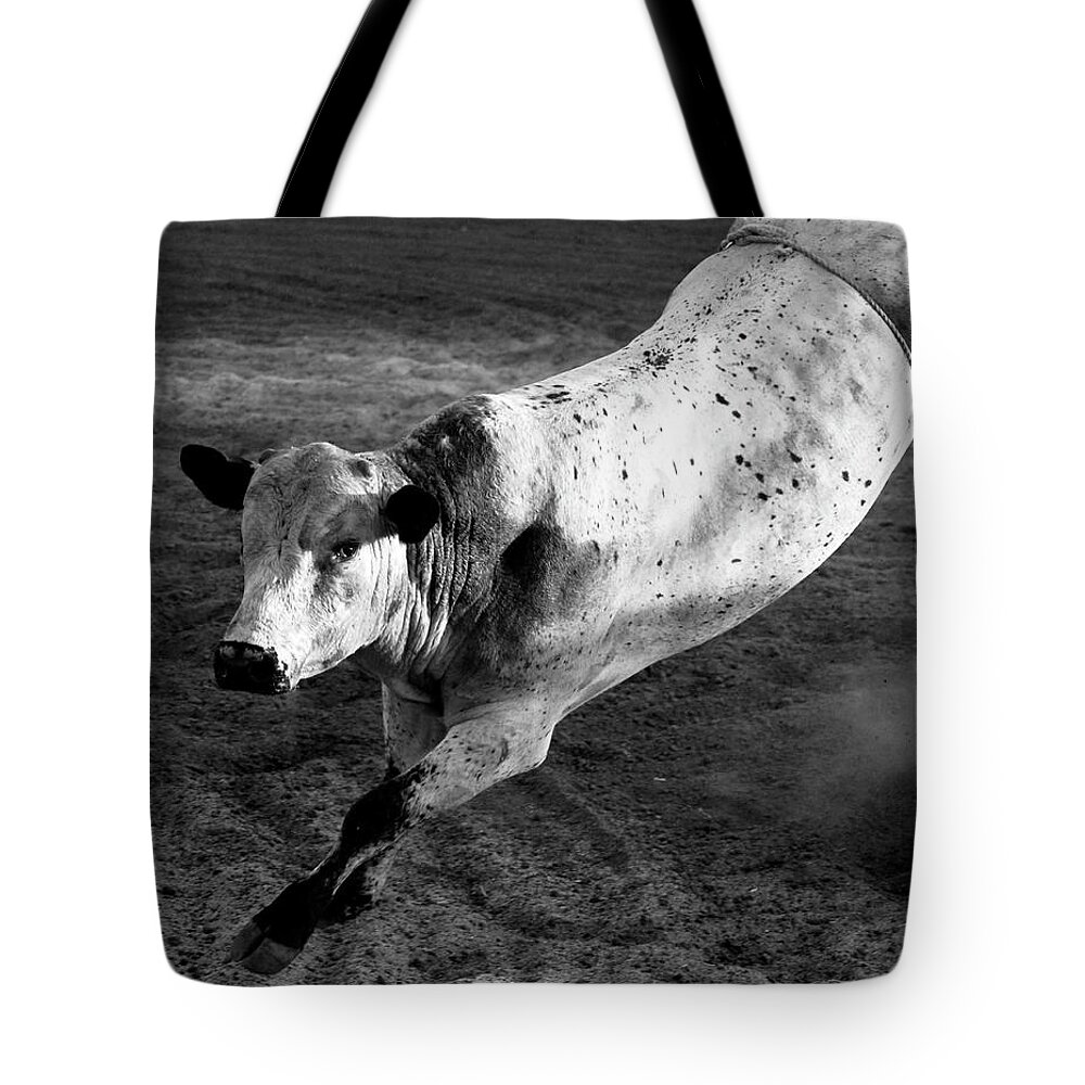 Denise Bruchman Tote Bag featuring the photograph Rowdy Bucking Bull by Denise Bruchman