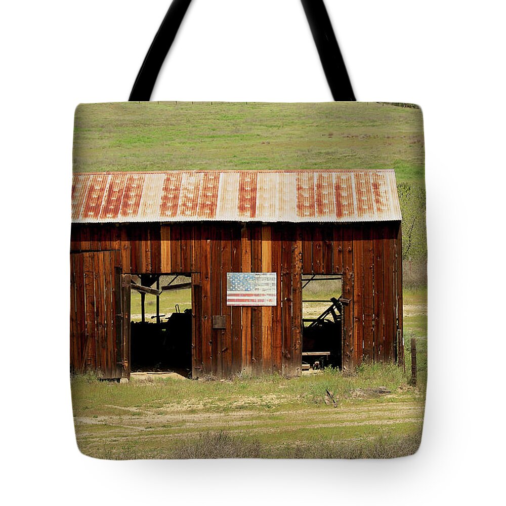 Soledad Tote Bag featuring the photograph Rustic Barn with Flag by Art Block Collections