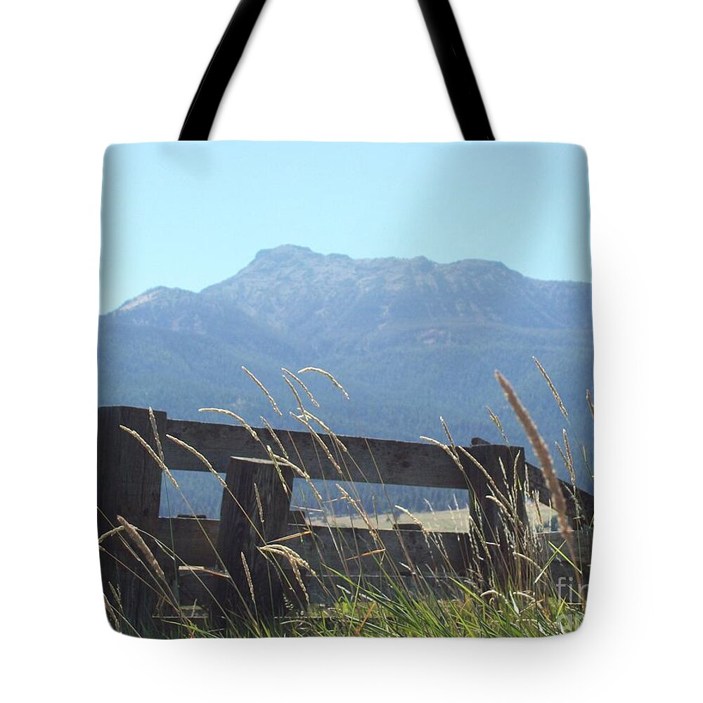 Landscape Tote Bag featuring the photograph Rustic Fence On Mountain Landscape by Carol Riddle