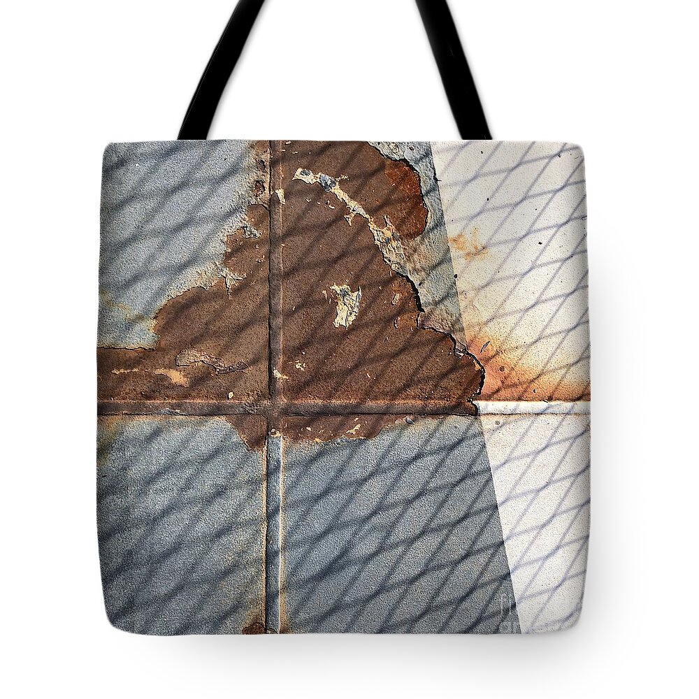 Rusty Floor Tote Bag featuring the photograph Rusty Cross by Flavia Westerwelle