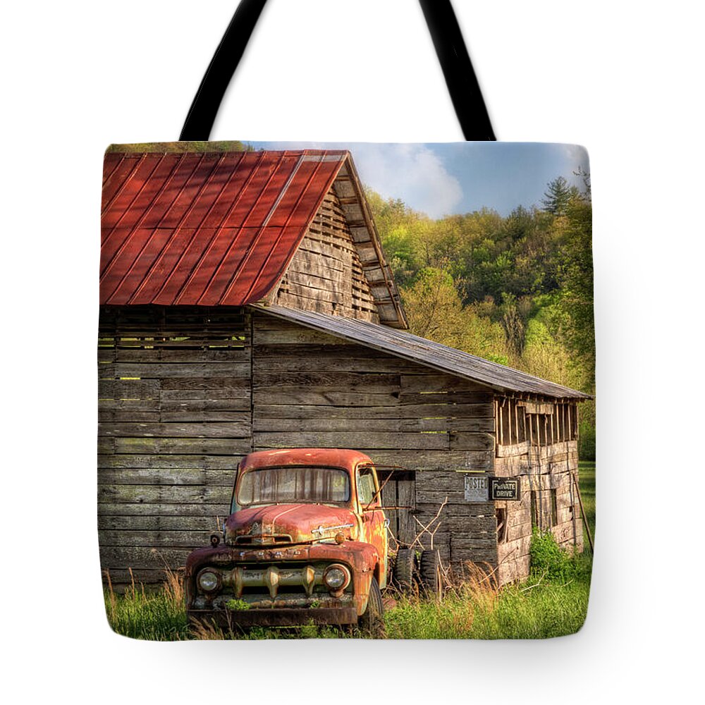 1940s Tote Bag featuring the photograph Rusty Ford at the Barn by Debra and Dave Vanderlaan