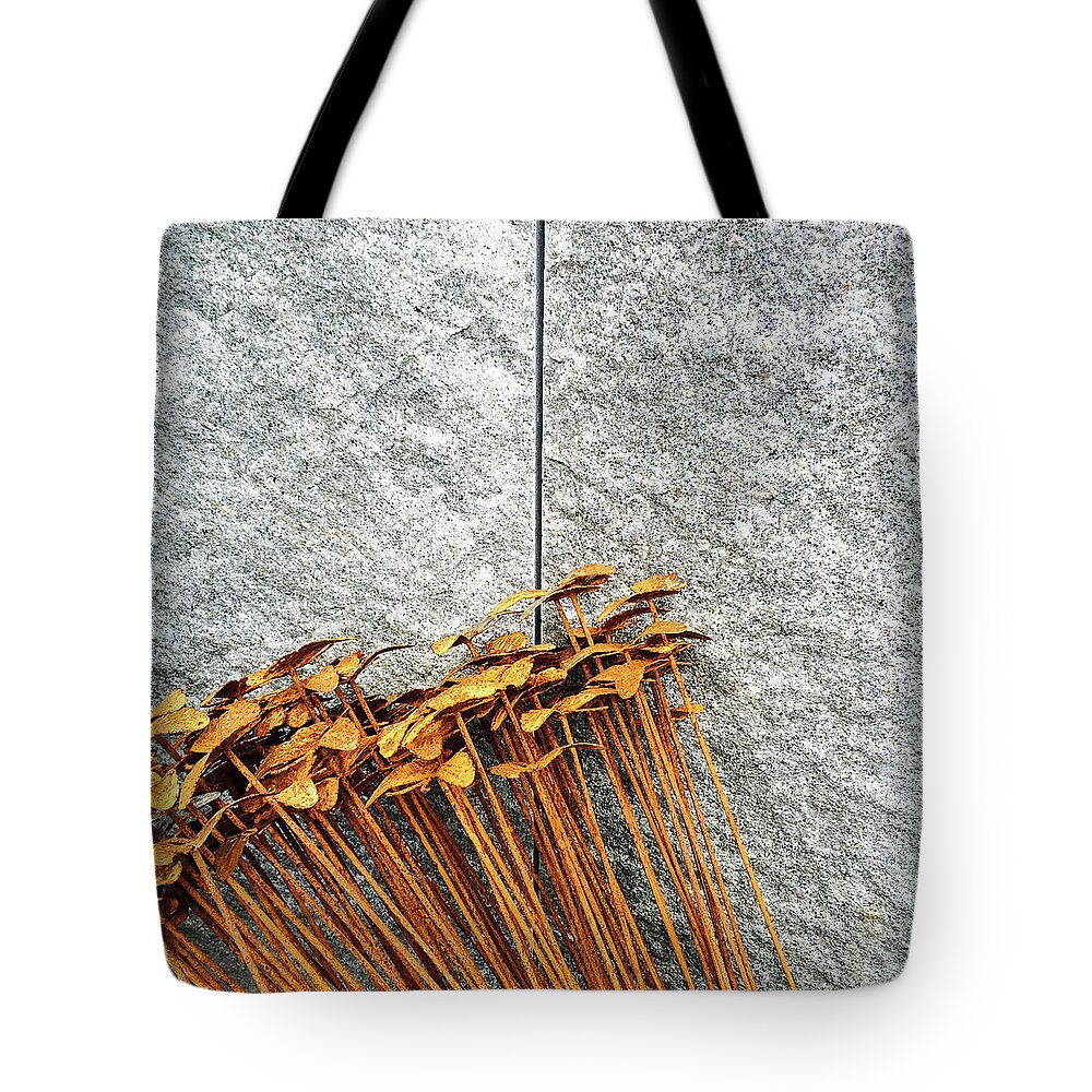 Flower Tote Bag featuring the photograph Rusty iron flowers on granite background by GoodMood Art