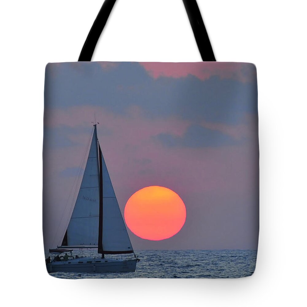 Sail Boats Tote Bag featuring the photograph Sailboat at sunset by Shay Levy