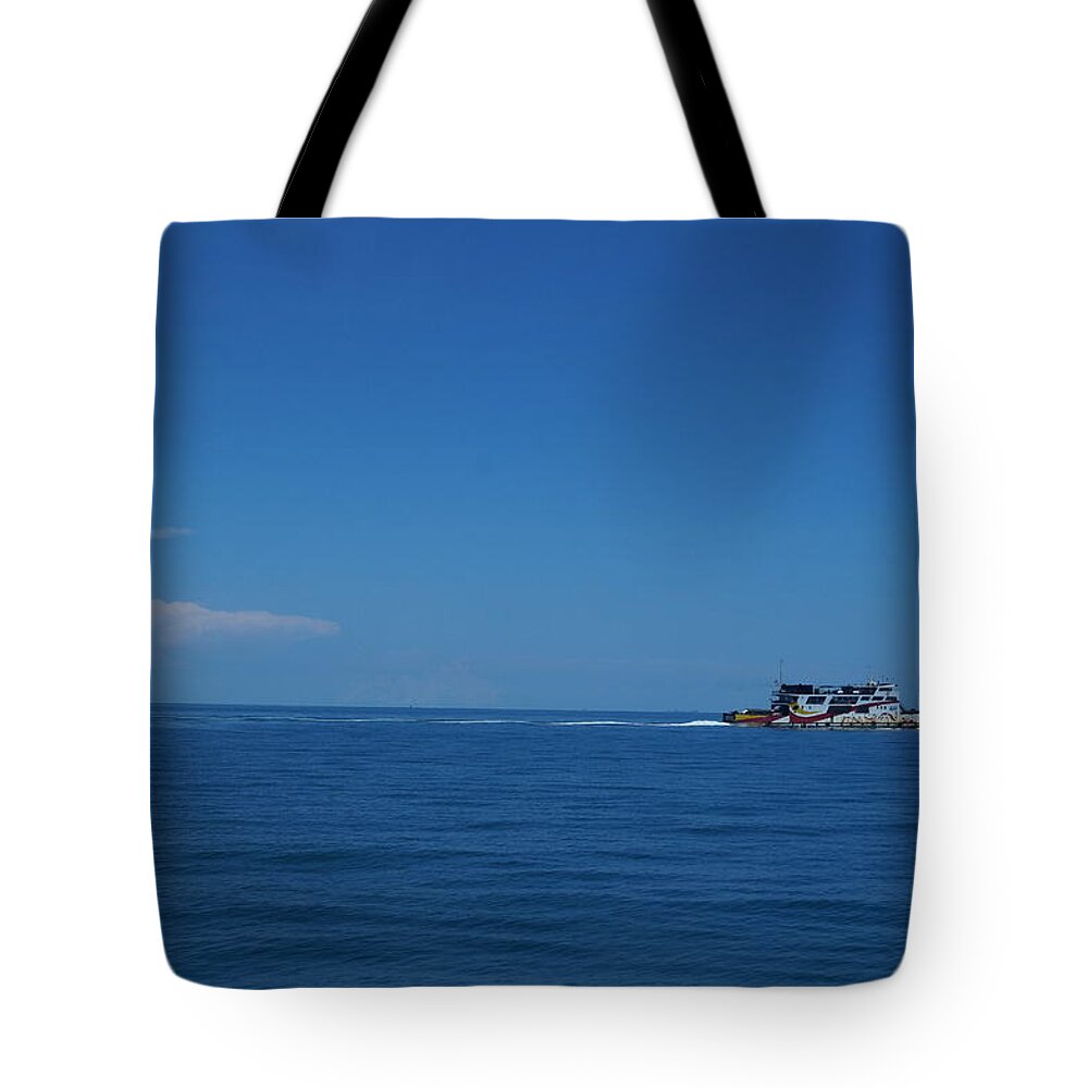 Sea Tote Bag featuring the photograph Sailing Away by Faashie Sha