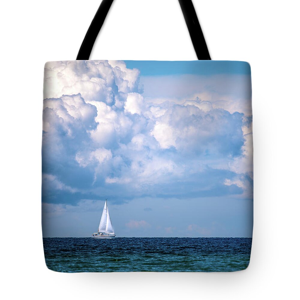 Little Traverse Bay Tote Bag featuring the photograph Sailing Under The Clouds by Onyonet Photo studios
