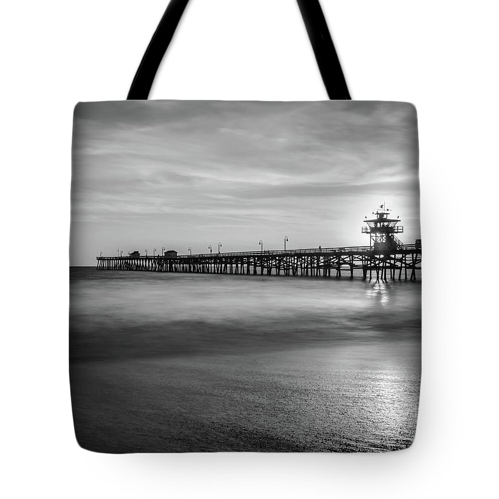 2017 Tote Bag featuring the photograph San Clemente Pier Sunset Black and White Photography by Paul Velgos