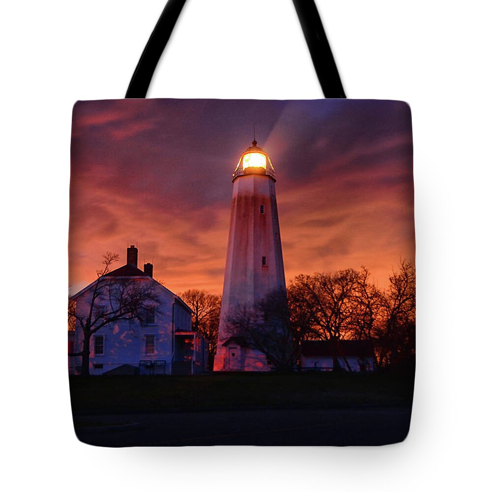 Sandy Hook Lighthouse Tote Bag featuring the photograph Sandy Hook Lighthouse by Raymond Salani III