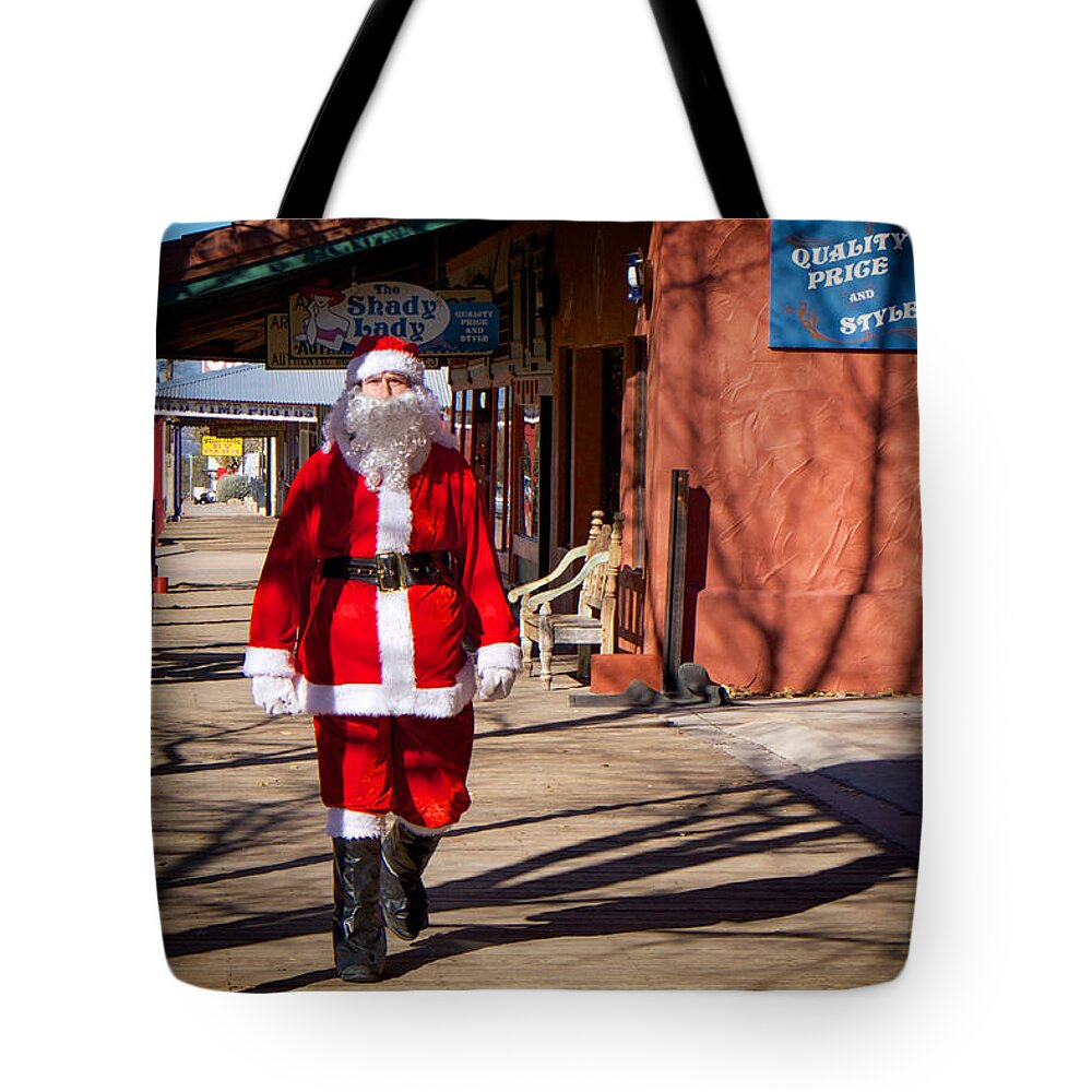 Arizona Tote Bag featuring the photograph Santa Claus is Coming to Town in Tombstone Arizona by Mary Lee Dereske