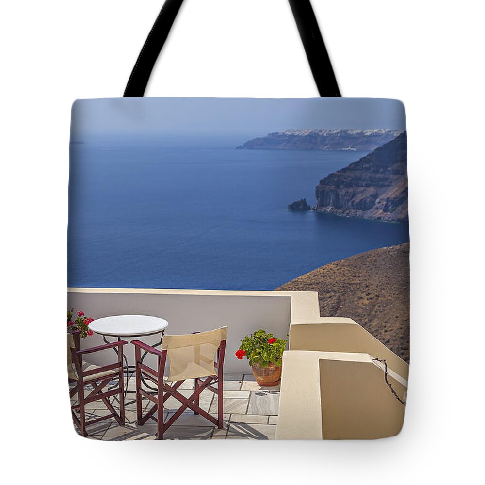Santorini Tote Bag featuring the photograph Santorini sun terrace by Sophie McAulay