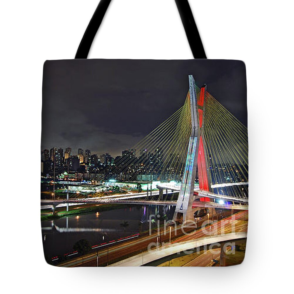 Sao Paulo Tote Bag featuring the photograph Sao Paulo Skyline - Ponte Estaiada Octavio Frias de Oliveira wit by Carlos Alkmin