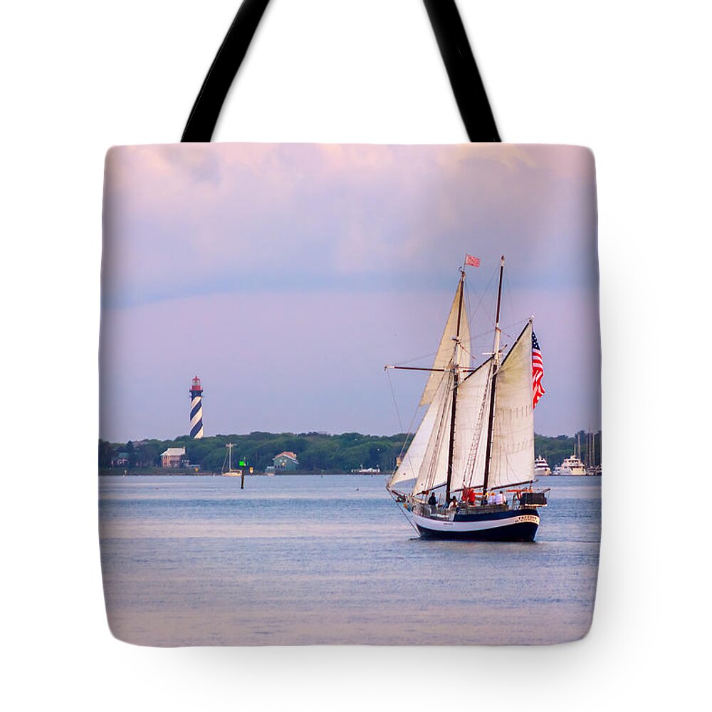 America Tote Bag featuring the photograph Scooner Freedom Near St. Augustine Lighthouse by Traveler's Pics
