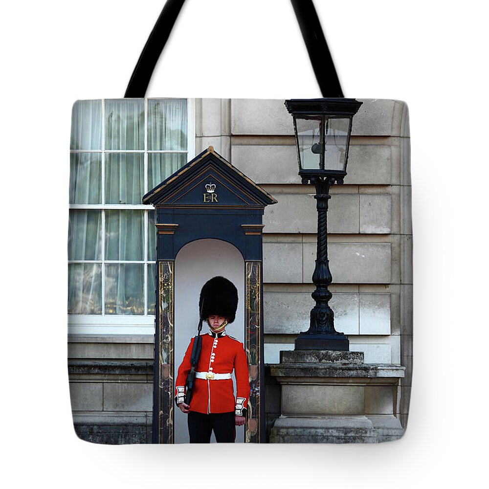 London Tote Bag featuring the photograph Scots Guard Buckingham Palace by James Brunker
