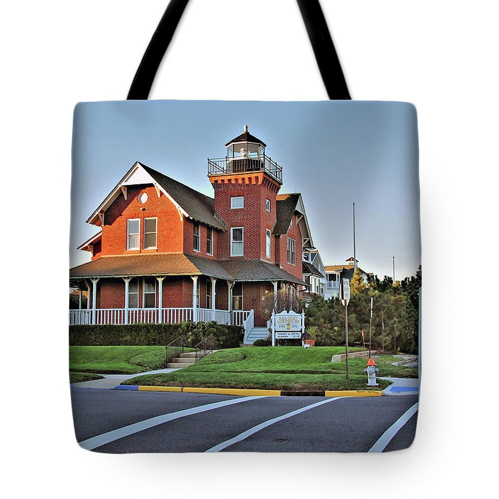 Sea Girt Light Station Tote Bag featuring the photograph Sea Girt Light Station by Ben Prepelka