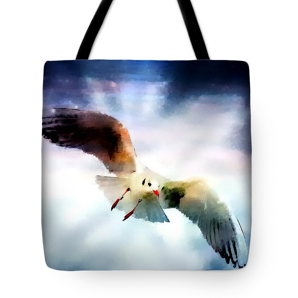Seagull Tote Bag featuring the photograph Seagull Flight 1 by Jean Francois Gil