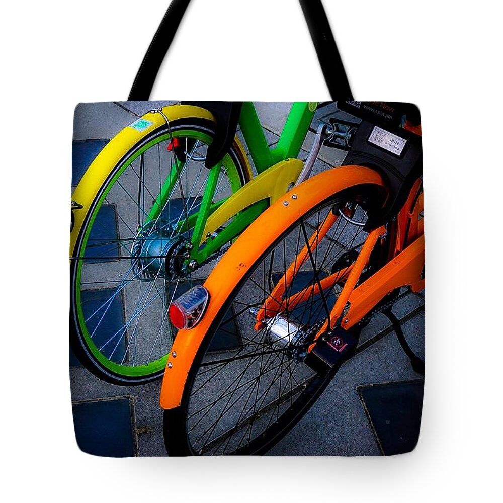 Bicycle Photograph Tote Bag featuring the photograph Seattle Bikes by Desmond Raymond