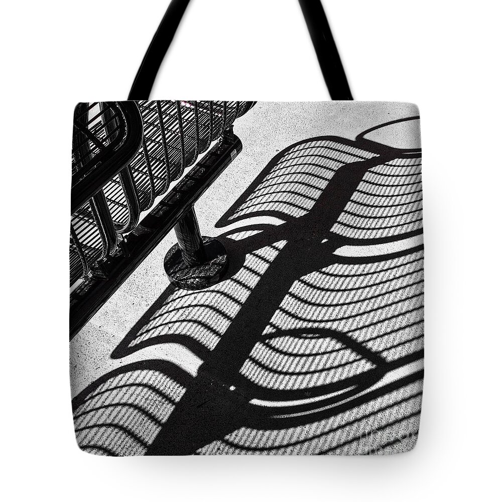 Shadow Tote Bag featuring the photograph Shadow Play. At the Station. by Miriam Danar