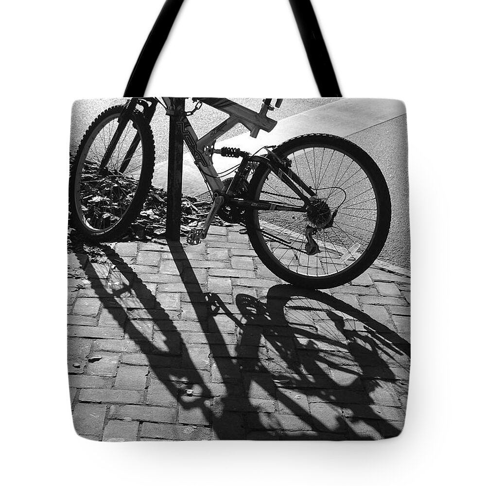 Black And White Tote Bag featuring the photograph Shadow Play by Suzanne Gaff