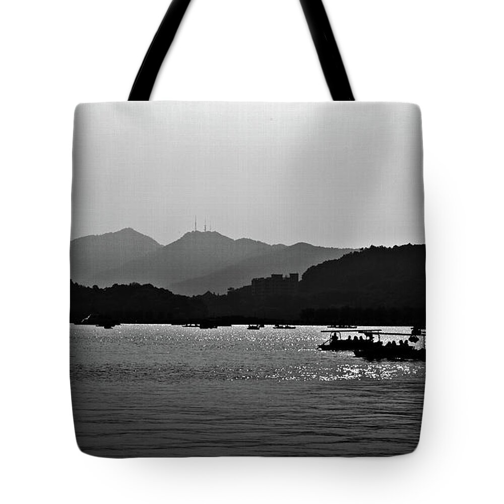 Shadows Tote Bag featuring the photograph Shadows on West Lake by George Taylor