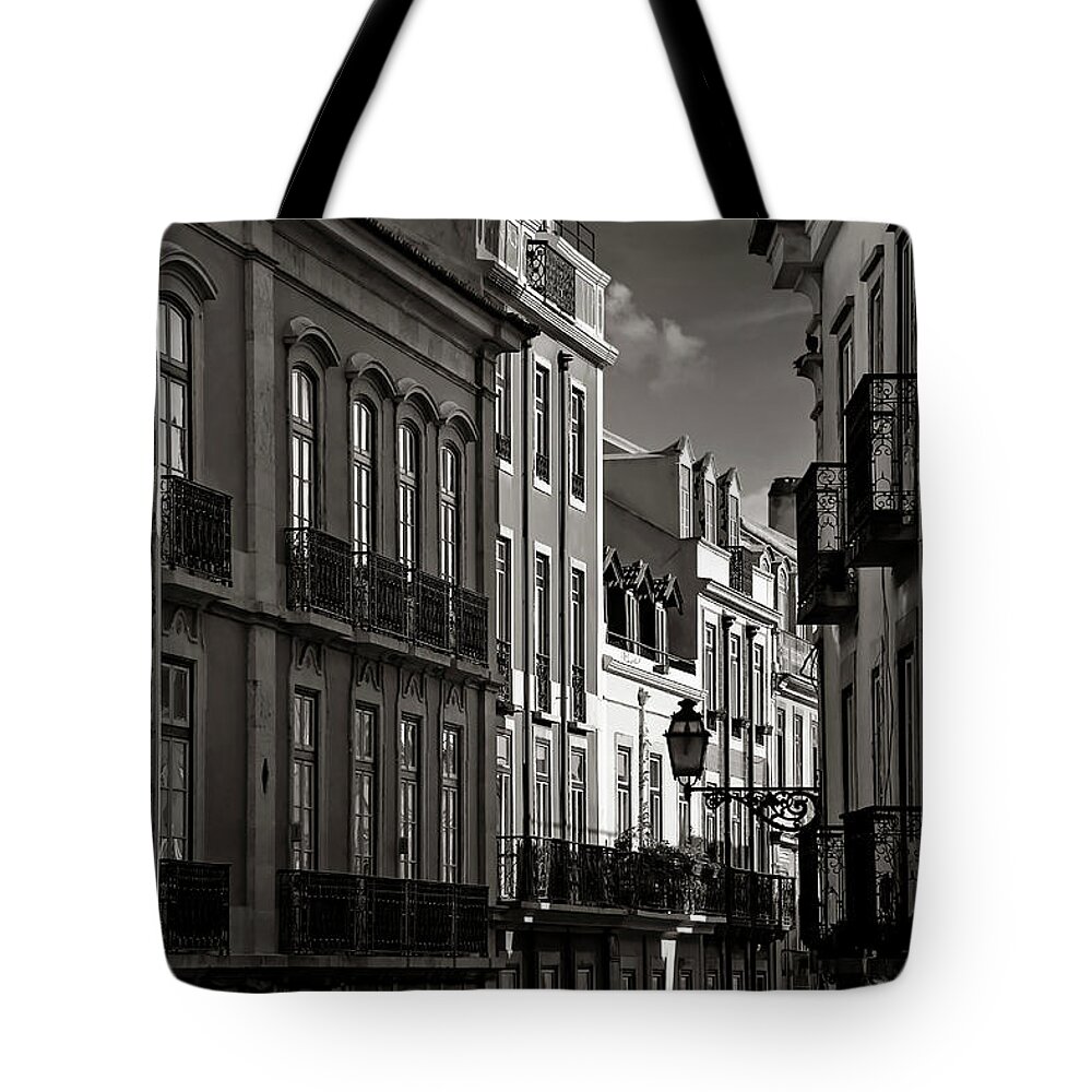 Lisbon Tote Bag featuring the photograph Shadowy Old Lisbon by Carol Japp