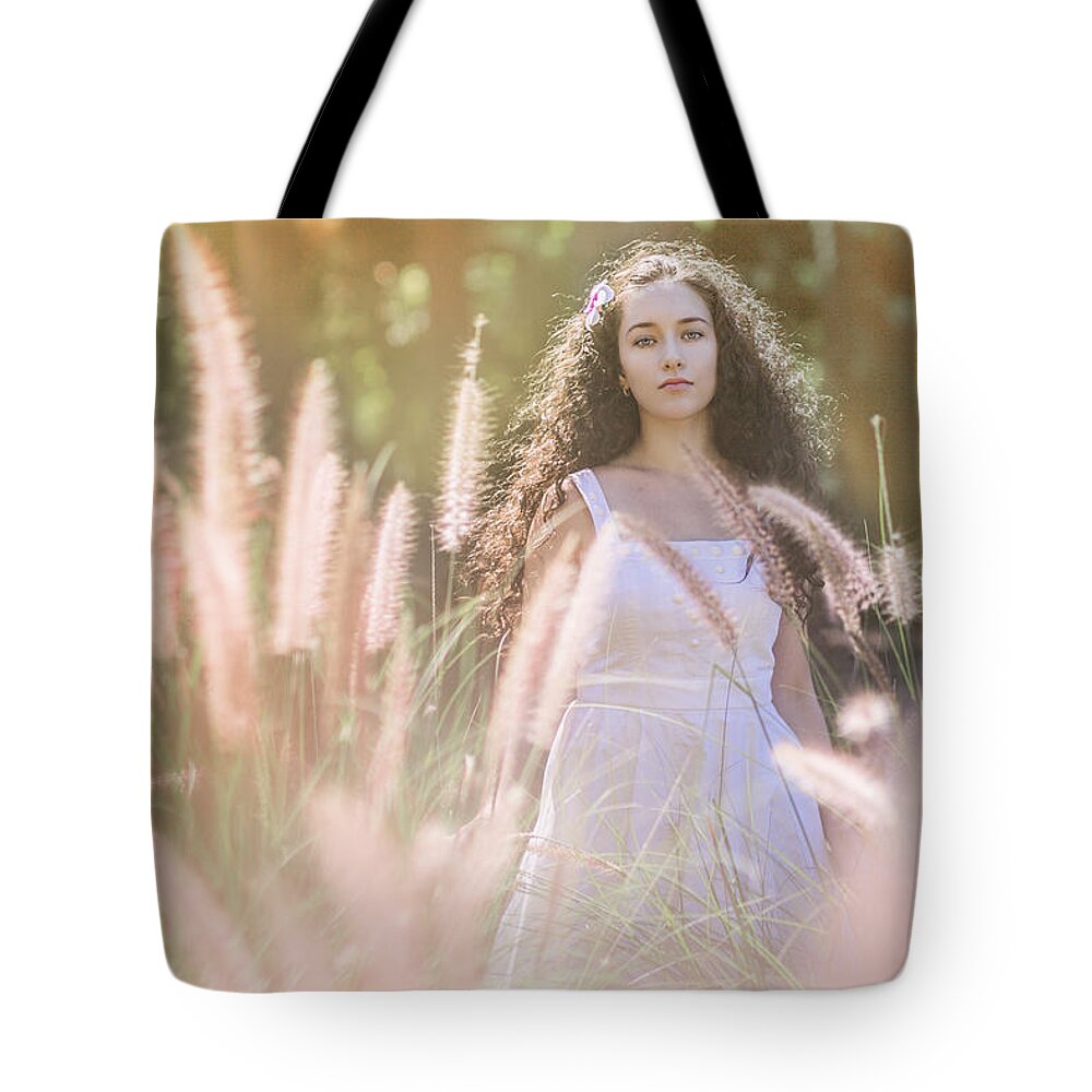 Adolescence Tote Bag featuring the photograph She Who Seeks Shall Find by Elvira Pinkhas