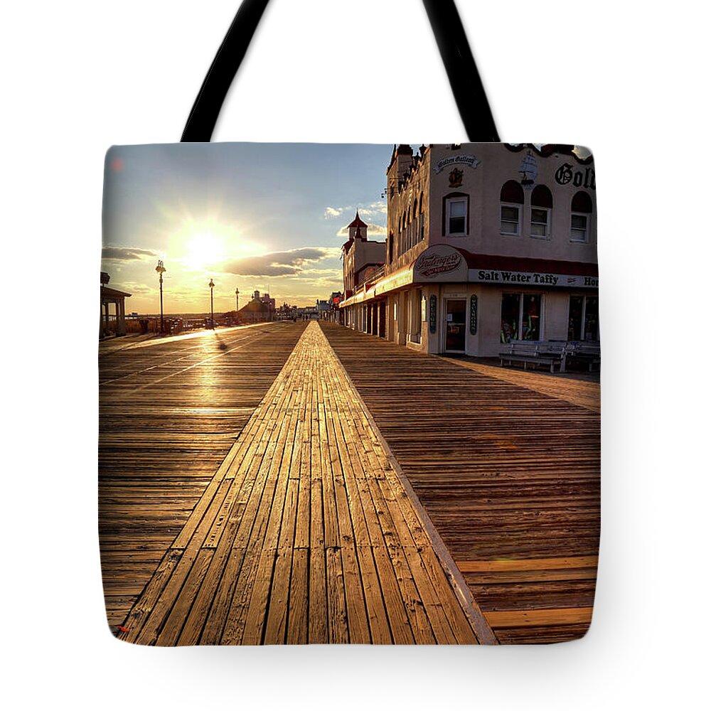 Boardwalk Tote Bag featuring the photograph Shining Walkway by John Loreaux