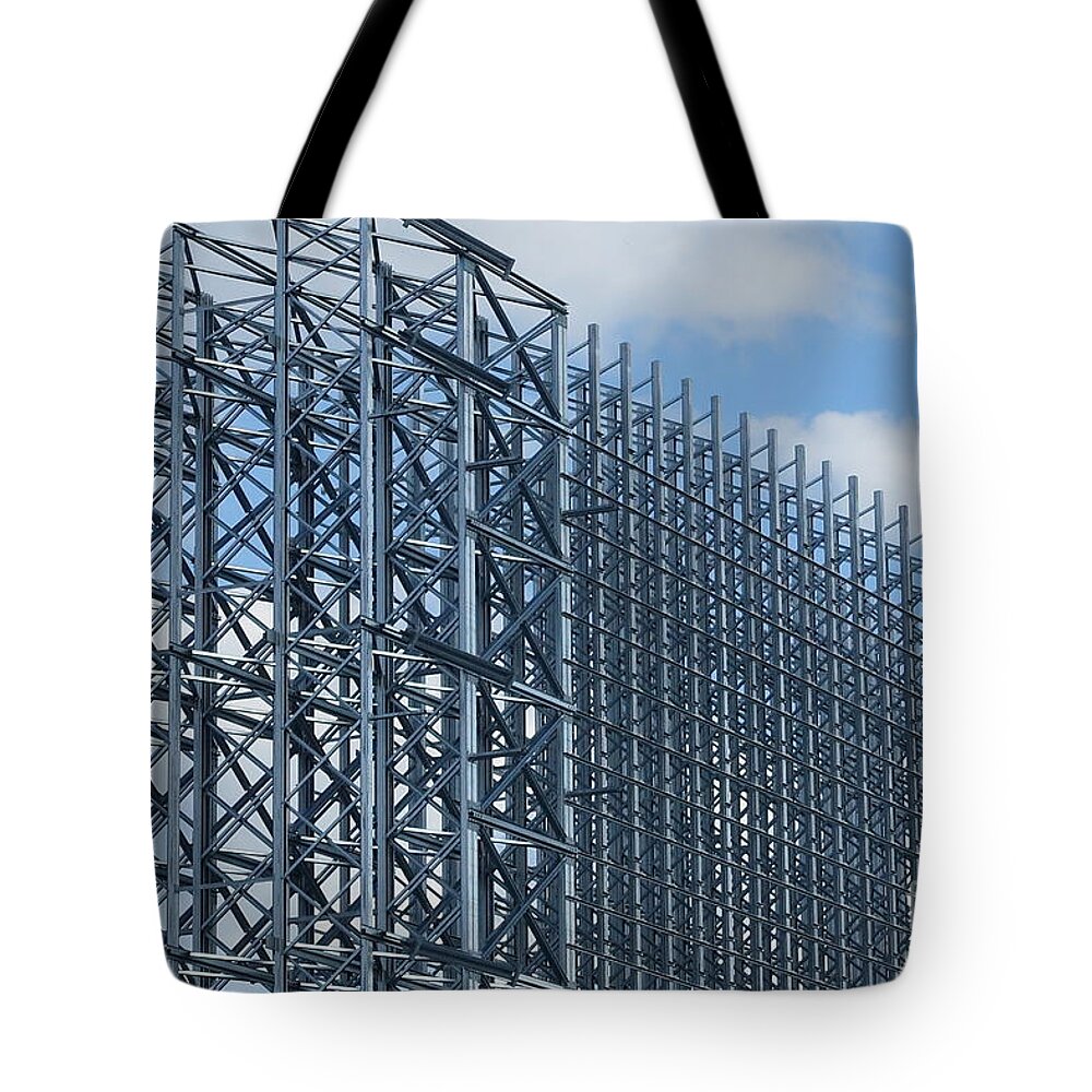 Steel Construction Tote Bag featuring the photograph Shiny Steel Construction in Nature by Eva-Maria Di Bella