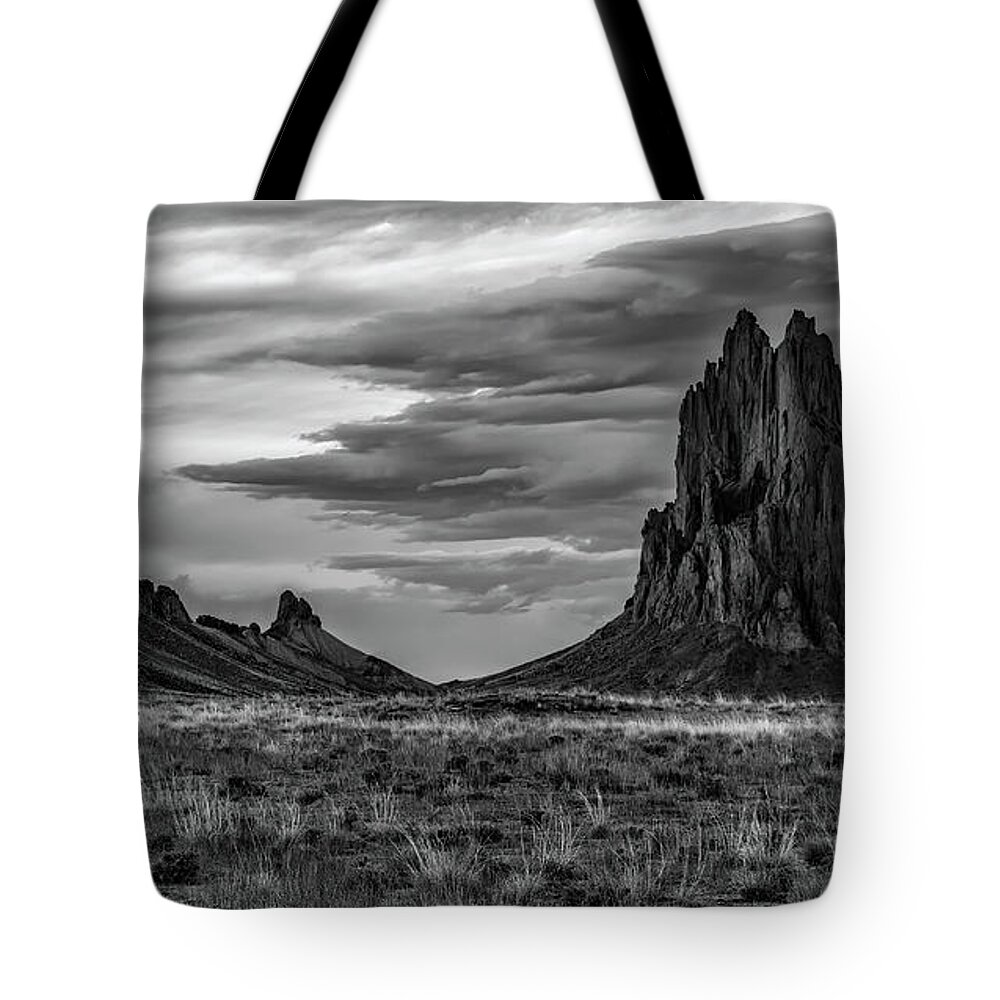 Shiprock Tote Bag featuring the photograph Shiprock In Black And White by Jaime Miller