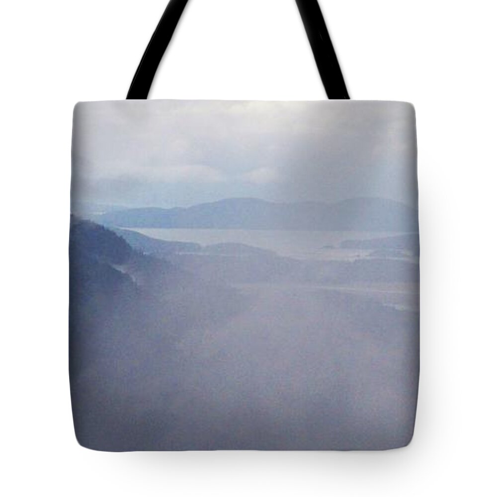 Clouds Tote Bag featuring the photograph Spellbound by Martin Cline