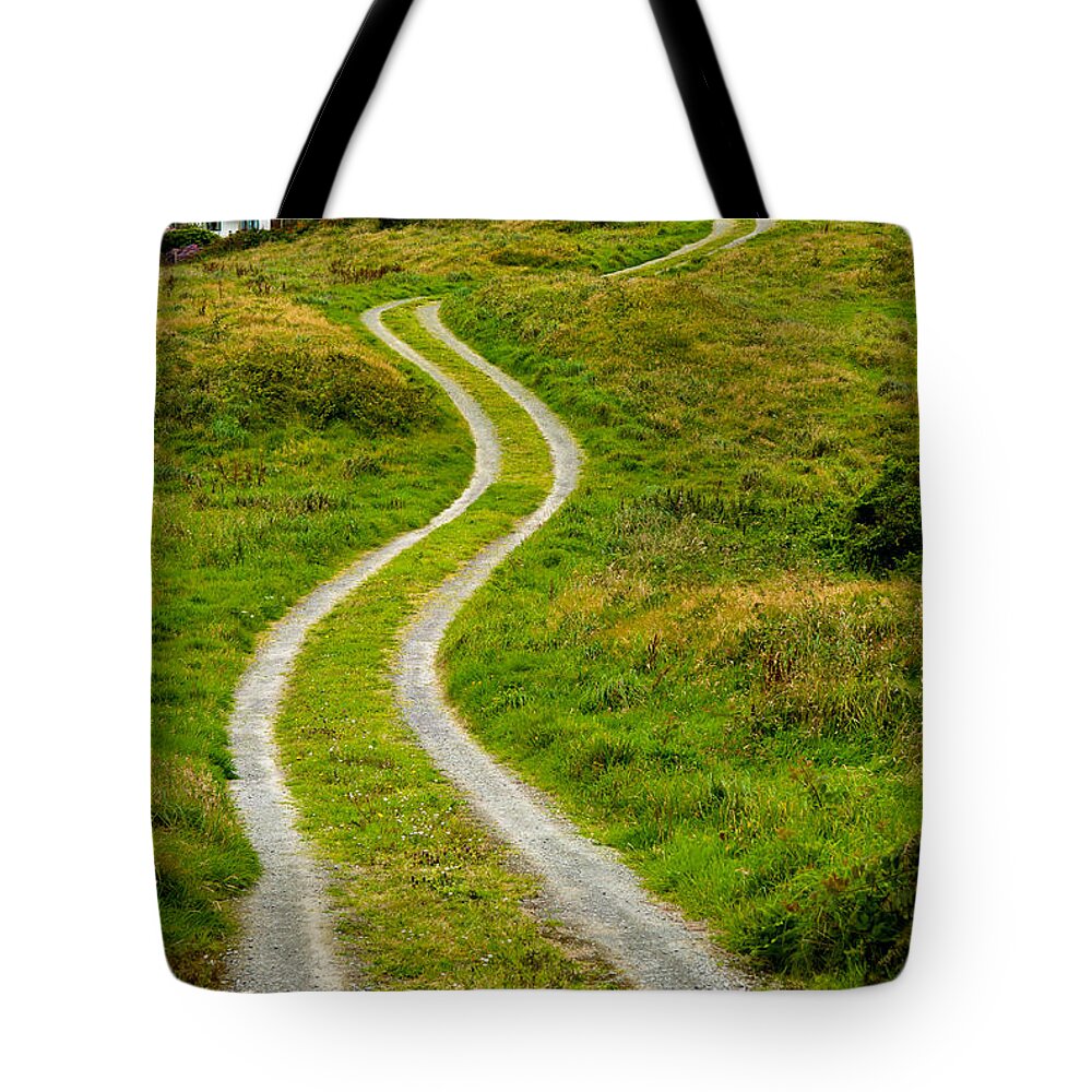 Photography Tote Bag featuring the photograph Single Track Gravel Road upon a Hill by Andreas Berthold