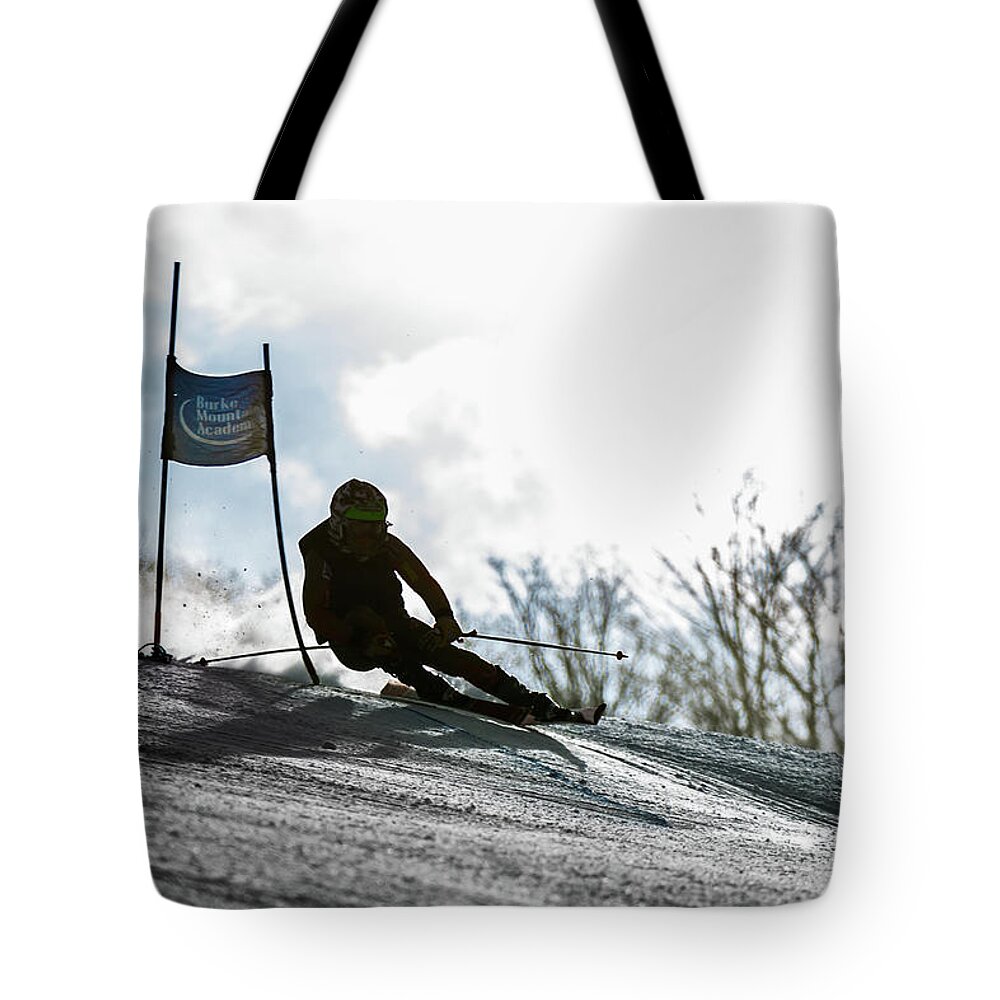 Burke Tote Bag featuring the photograph Ski Racer Backlit by Tim Kirchoff