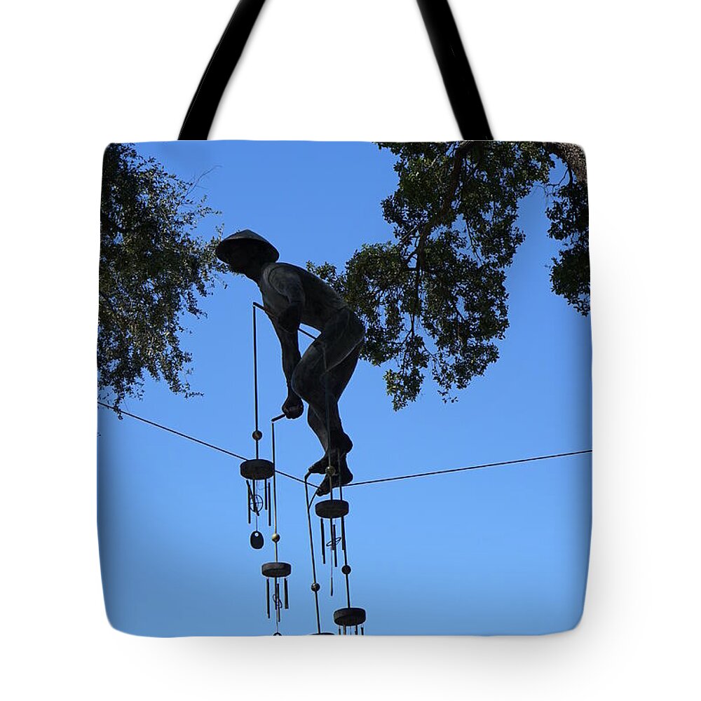 Tight Rope Tote Bag featuring the photograph Sky Walker by Laurie Perry