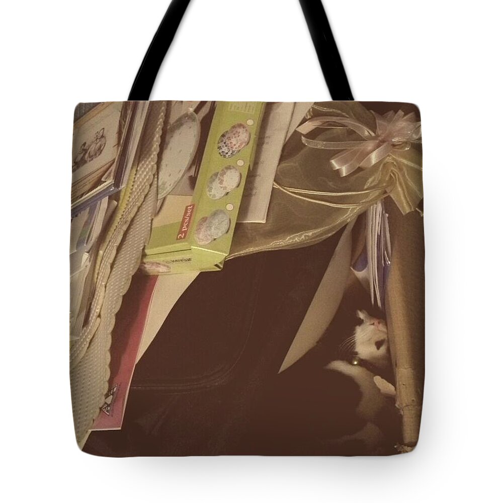 Cat Tote Bag featuring the photograph Sleeping with Things by Sukalya Chearanantana