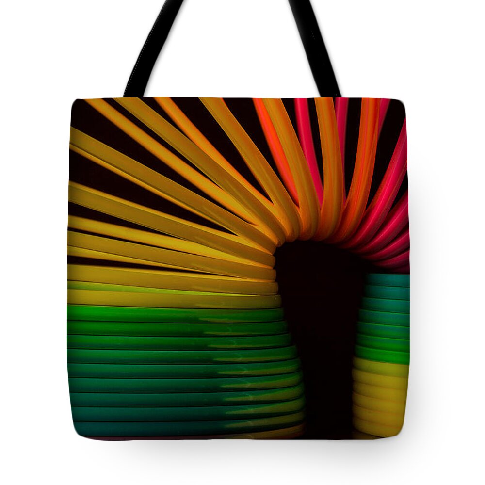 Slinky Tote Bag featuring the photograph Slinky by Bob Cournoyer