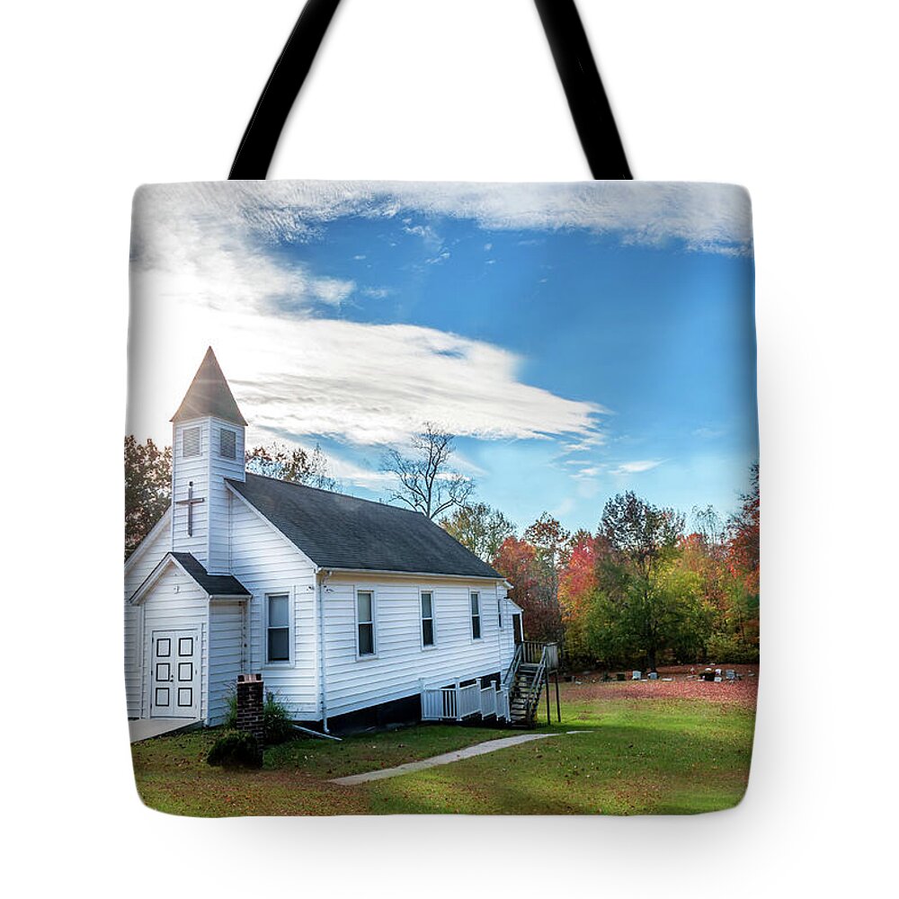 Church Tote Bag featuring the photograph Small Wooden Church in the countryside during Autumn by Patrick Wolf