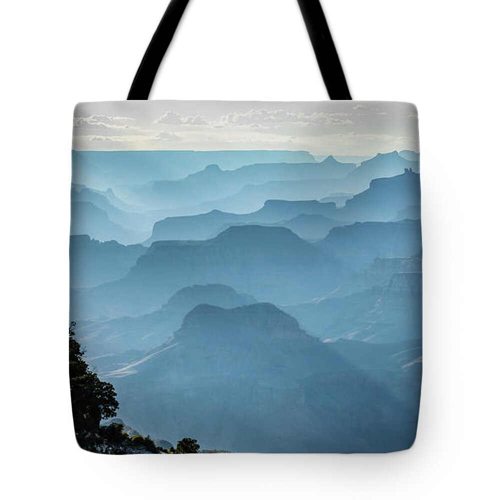 Grand Canyon West Tote Bag featuring the photograph Smoky Canyons by Steven Sparks