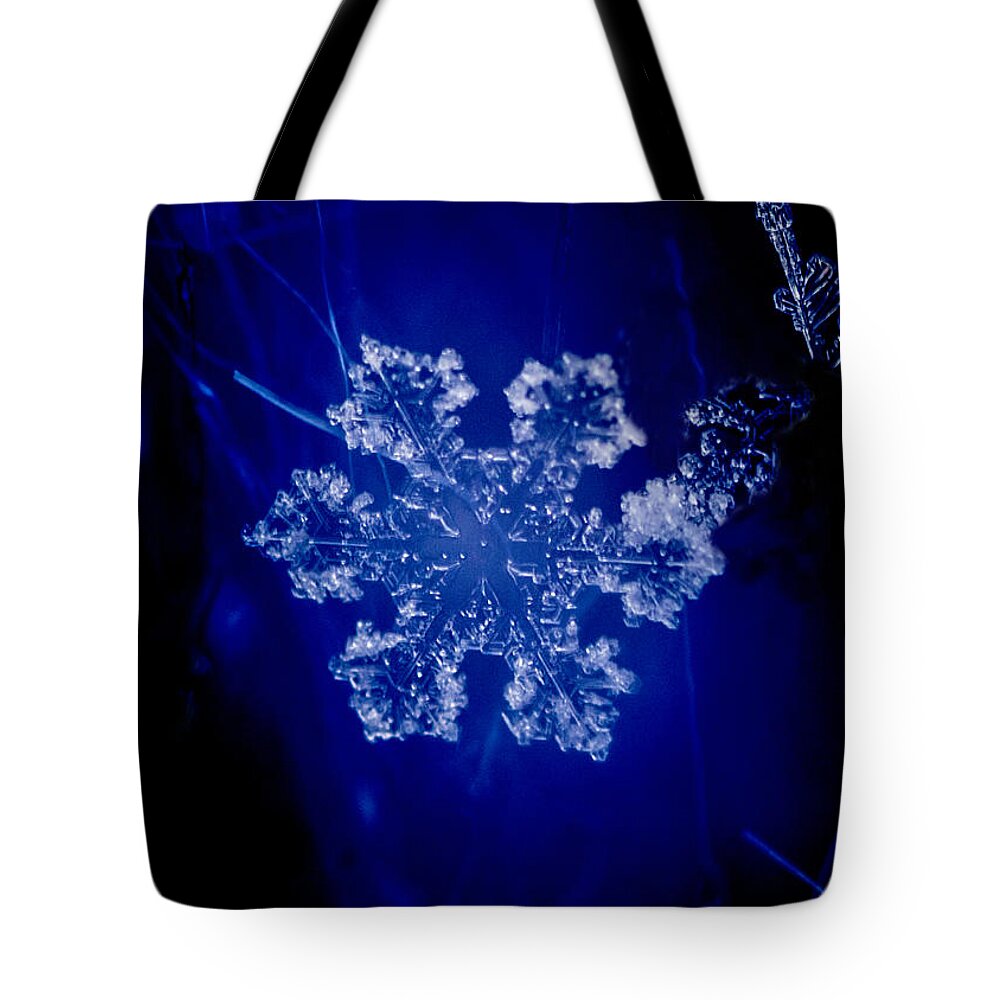 Colorado Tote Bag featuring the photograph Snowflake on Blue by Dawn Key